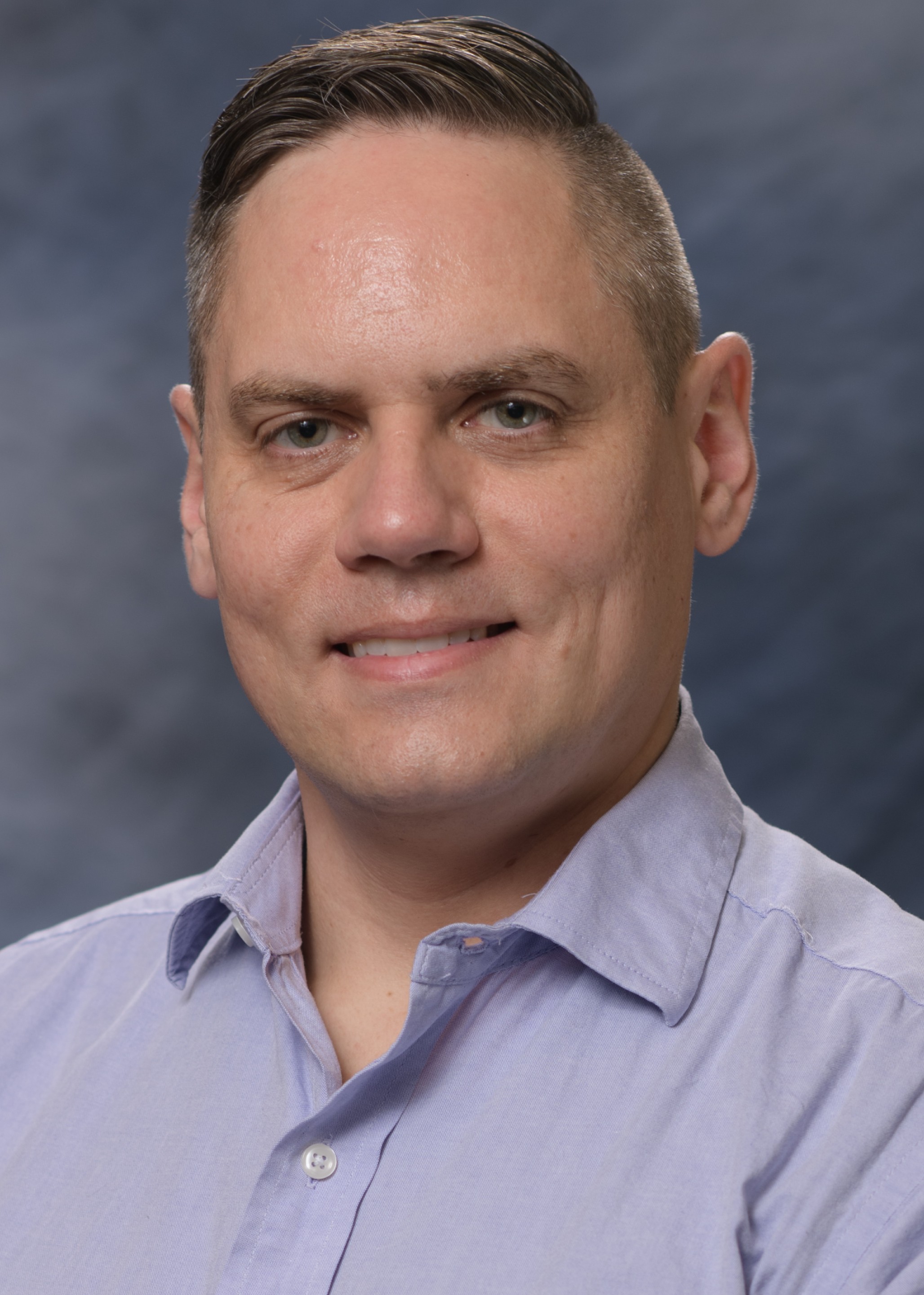 Aleks headshot - 2024 - cropped